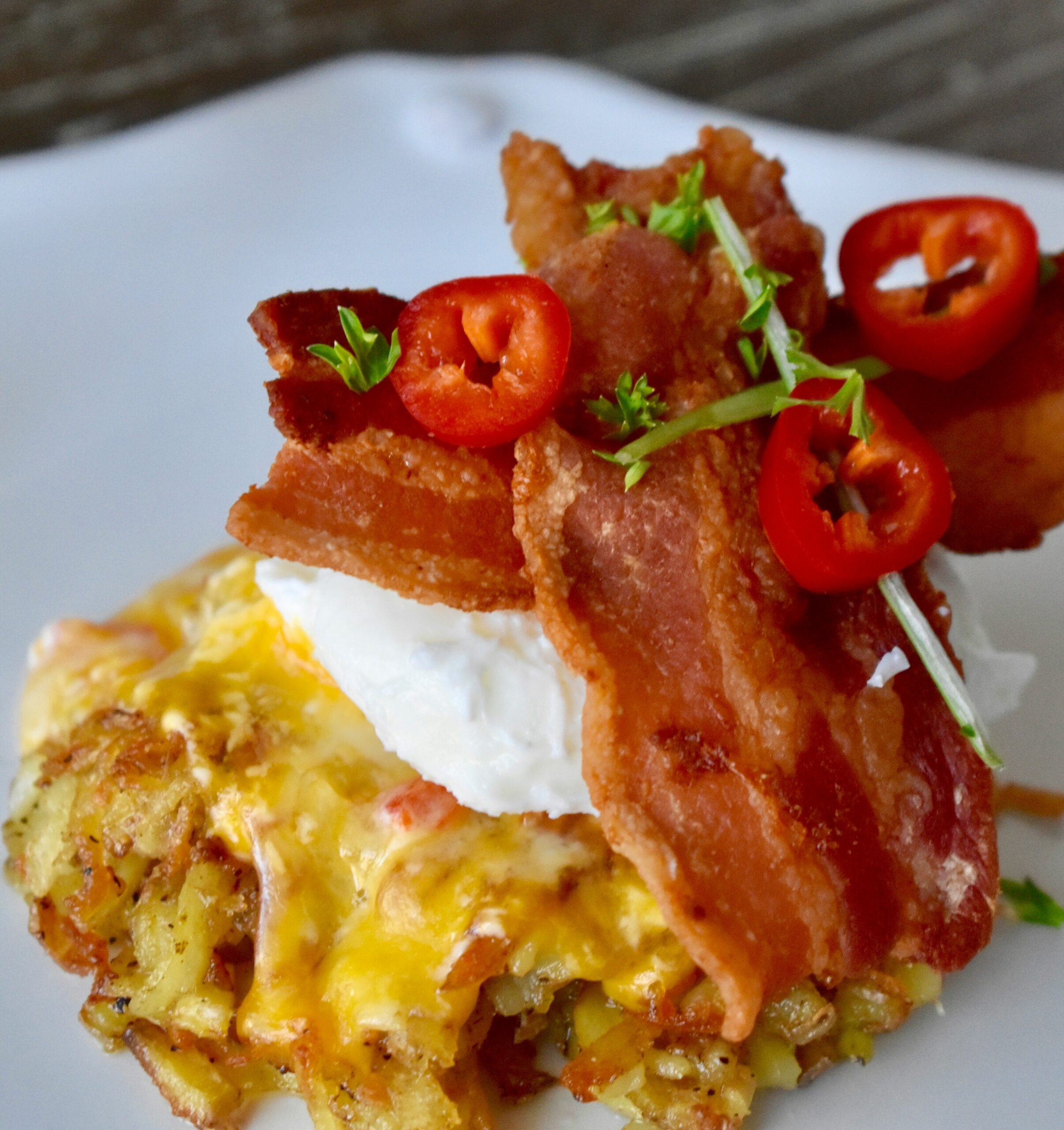 Hashbrown stack with poached egg and bacon